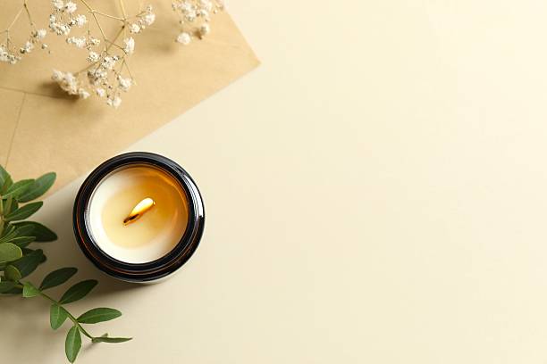 Aromatic soy candle on color background